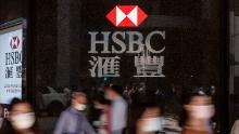 HSBC plans to speed up restructuring as profits drop 36%