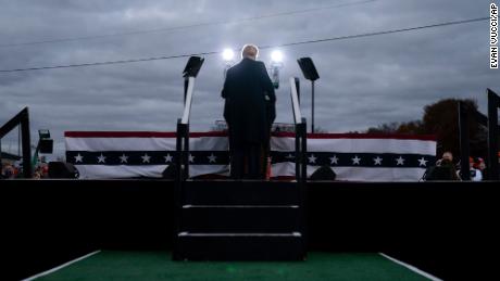 ‘It’s a little tough out here’: Trump blitzes must-win states with perfected rally routine