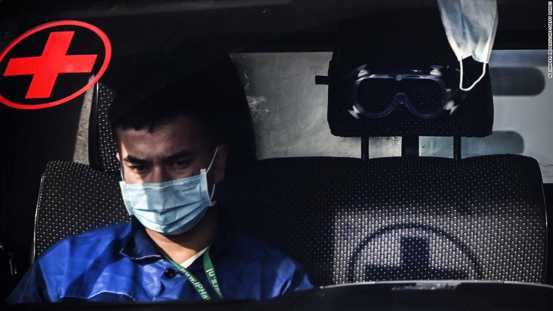 A medic sits in an ambulance in Kommunarka, Russia, on October 27.