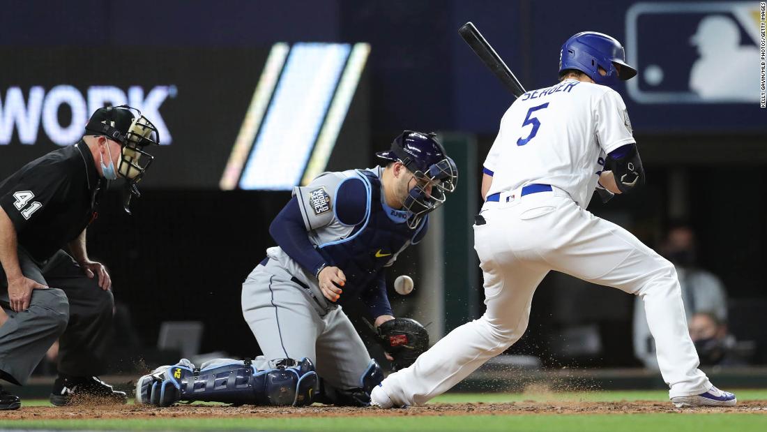Rays&#39; Mike Zunino chases a wild pitch by Nick Anderson in the sixth inning.