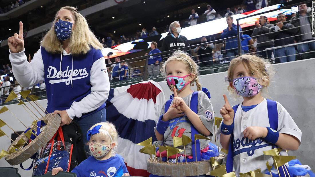 Los Angeles Dodgers fans pose for a photo prior to Game 6.