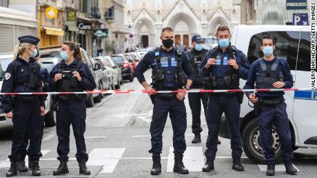 Police block the access to the Notre-Dame de l&#39;Assomption Basilica in Nice on October 29, 2020 after a knife-wielding man kills three people at the church, slitting the throat of at least one of them, in what officials are treating as the latest jihadist attack to rock the country. (Photo by Valery HACHE / AFP) (Photo by VALERY HACHE/AFP via Getty Images)