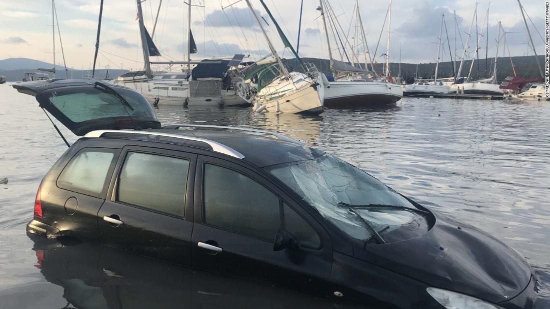 A car and boats are damaged on the coast of Izmir.