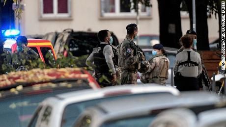 Security forces were deployed after a priest was shot Saturday in Lyon, France.