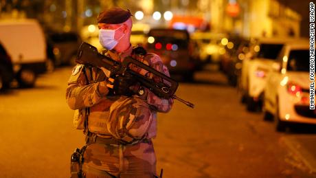 A French soldier stands guard after the incident in Lyon on Saturday.