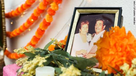 The ofrenda at Tres Leches Café has a photo of Magaly Saenz&#39;s partner&#39;s grandparents. The grandfather has passed away, but the grandmother is still alive. 