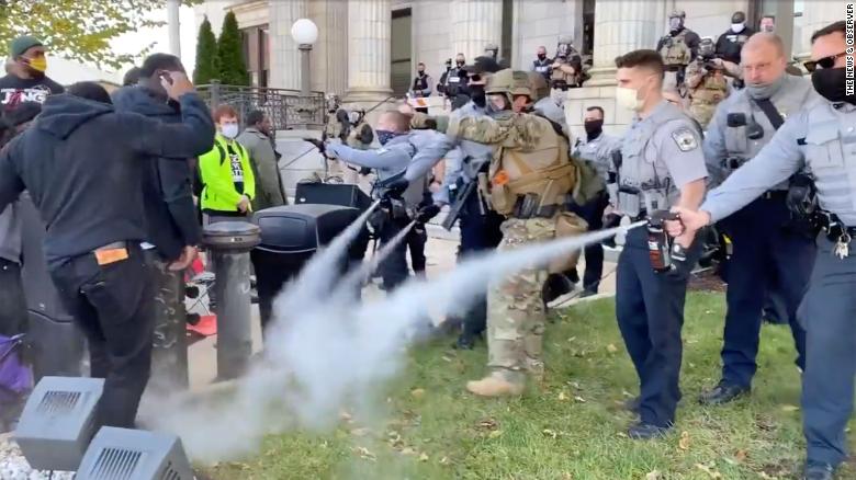 Police used pepper spray to break up a North Carolina march to a polling place
