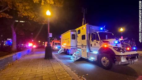 A Police truck is parked near the National Assembly of Quebec, in Quebec City,  after two people were killed and five wounded by a suspect now in custody. 