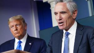 US President Donald Trump (L) listens to White House coronavirus adviser Dr. Scott Atlas speak during a press conference in the Brady Briefing Room of the White House on September 23, 2020, in Washington, DC. (Photo by MANDEL NGAN / AFP) (Photo by MANDEL NGAN/AFP via Getty Images)