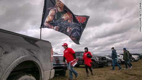 Supporters of President Donald Trump leave after a Trump campaign rally on November 01, 2020 in Washington, Michigan.