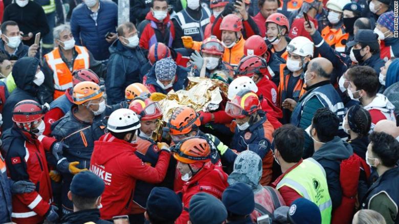 Three children pulled from rubble days after quake