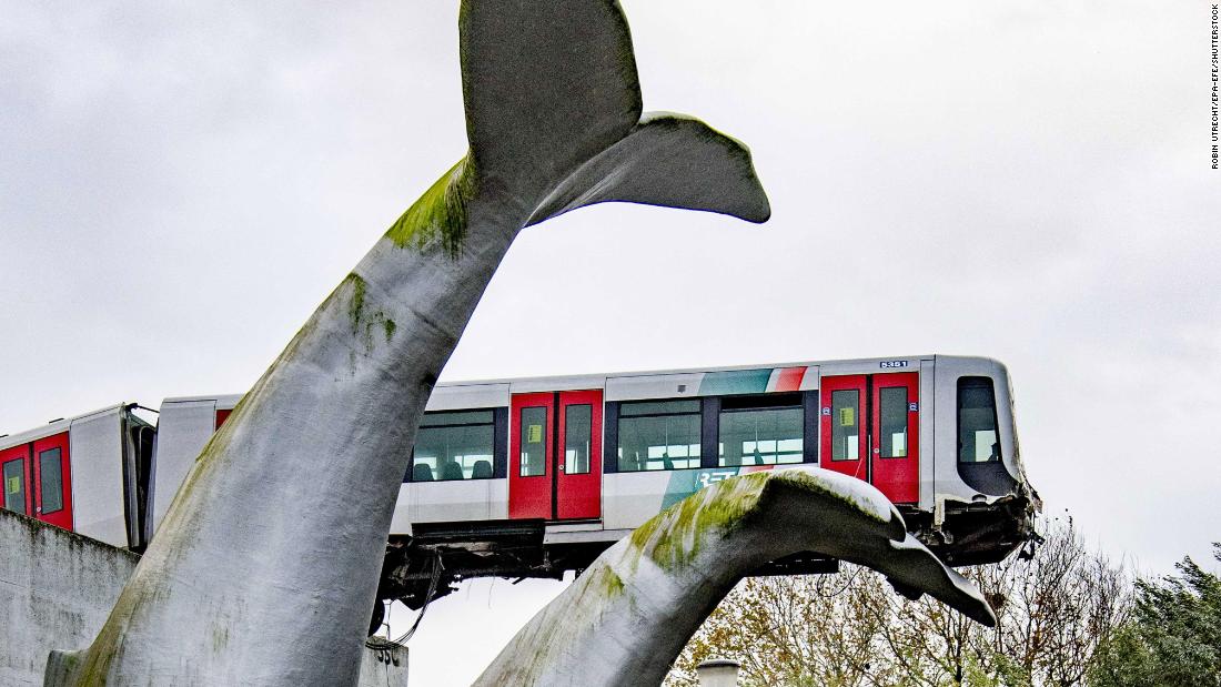 Dutch subway train lands on giant whale tail sculpture after crashing ...