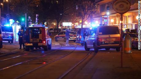 Police cars and ambulances stand in the central Vienna on November 2, 2020, following a shooting near a synagogue. - Multiple gunshots were fired in central Vienna on the evening of November 2, 2020, according to police, with the location of the incident close to a major synagogue. Police urged residents to keep away from all public places or public transport. One attacker was &quot;dead&quot; and another &quot;on the run&quot;, with one police officer being seriously injured, Austria&#39;s interior ministry said according to news agency APA. (Photo by GEORG HOCHMUTH / APA / AFP) / Austria OUT (Photo by GEORG HOCHMUTH/APA/AFP via Getty Images)