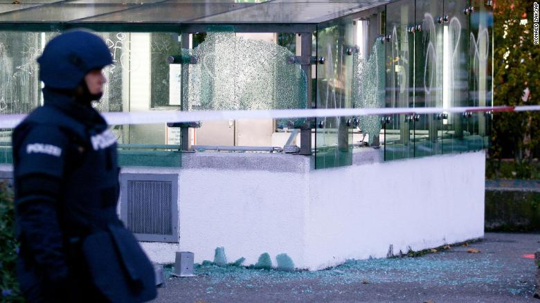 A police officer patrols following the shooting.