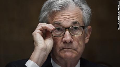 Fed keeps interest rates near zero and warns of further pandemic strain on the economy 