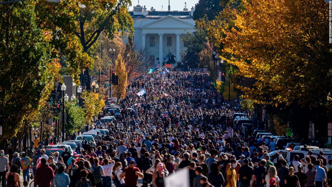 A crowd gathers in front of the White House on November 7.