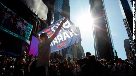 People celebrate at Times Square in New York after  Biden was declared the winner.