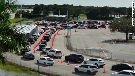 Cars wait in line at the Coronavirus (COVID-19) drive in testing site, on the day of the 2020 Presidential Election at the parking lot of Hard Rock Stadium as Florida reported a surge of COVID-19 cases on November 03, 2020 in Miami Gardens, Florida. (Photo by JL/Sipa USA)(Sipa via AP Images)