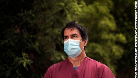 Dr. Robert Rodriguez, an emergency room doctor at San Francisco General Hospital, in front of the hospital in San Francisco on Monday, July 20, 2020.