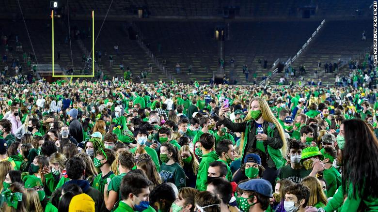 Notre Dame orders Covid-19 testing for students after fans rushed the field to celebrate a football win