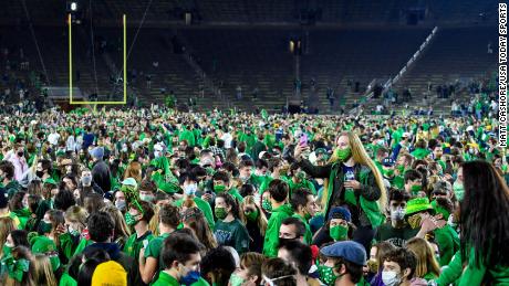 Notre Dame orders students to test for Covid-19 after fans rush to the pitch to celebrate football victory