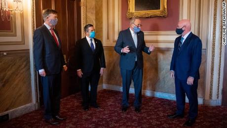 Senate Minority Leader Chuck Schumer, D-N.Y., center right, meets with Sen.-elect John Hickenlooper, D-Colo., left, Sen.-elect Ben Ray Luján, D-N.M.,and Sen.-elect Mark Kelly, D-Ariz, in Washington on Monday, November 9.