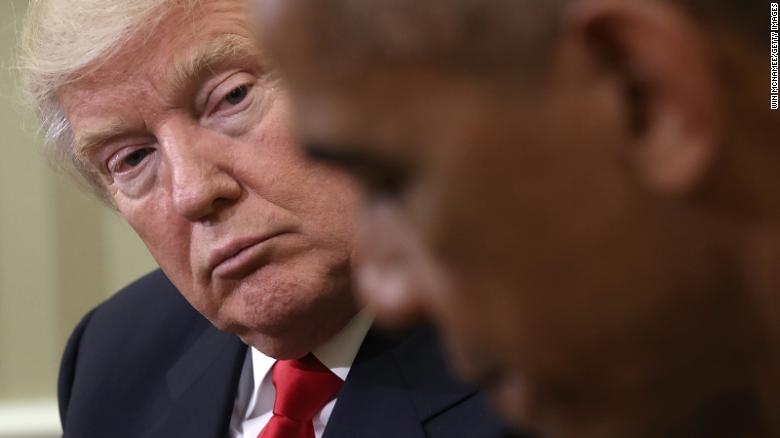 President Barack Obama speaks while meeting with then-President-elect Donald Trump following a meeting in the Oval Office November 10, 2016.