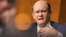 Sen. Chris Coons asks a question to Secretary of State Mike Pompeo as he testifies during a Senate Foreign Relations committee hearing on July 30, 2020. 