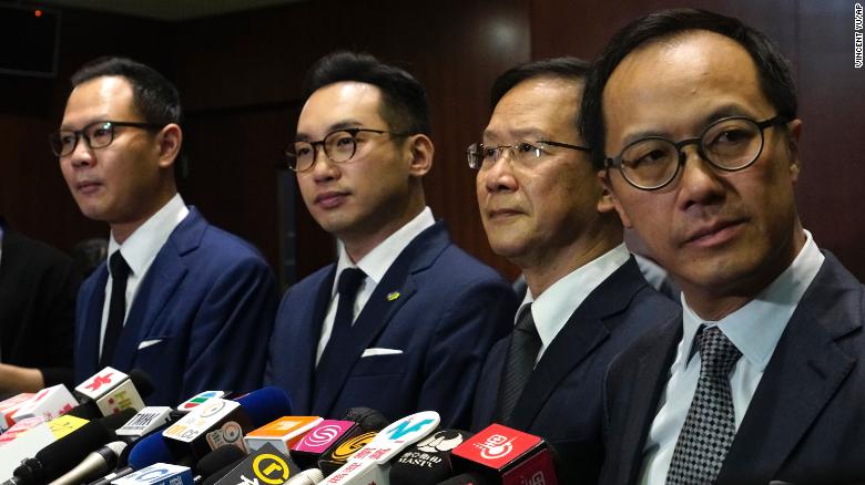 Four Hong Kong pro-democracy lawmakers unseated as Beijing moves to silence opposition