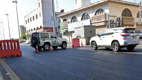 Saudi police close a street leading to a non-Muslim cemetery in Jeddah where a bomb struck a World War I commemoration.