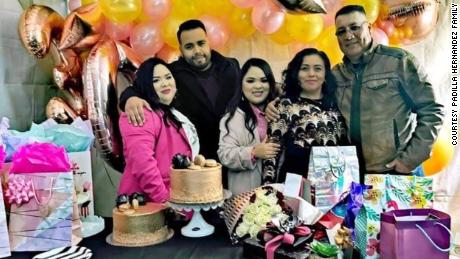 Sergio with his twin sisters and parents at the sisters&#39; 30th birthday.