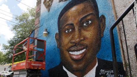 A mural of Ahmaud Arbery in Brunswick, where the 25-year-old was shot and killed in February. 