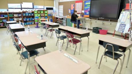 Jackie Sato, a teacher at Yung Wing School P.S. 124, teaches remotely from her classroom on September 24, 2020, in New York City. New York City Mayor Bill de Blasio said Thursday the city is preparing to shut its schools down if the Covid-19 test positivity rate continues to rise. 