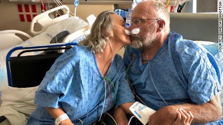 Chad and Tracy Larsen share a date night for their 34th wedding anniversary in an intensive care unit in Utah, where both fought for their lives after contracting Covid-19.  It would be their last date together.  