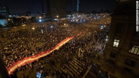Protesters marched with a huge national flag as protesters gathered in front of the Palacio de Justicia in Lima, Peru on November 14, 2020, against the removal of President Martin Vizcarra with a huge national flag. 