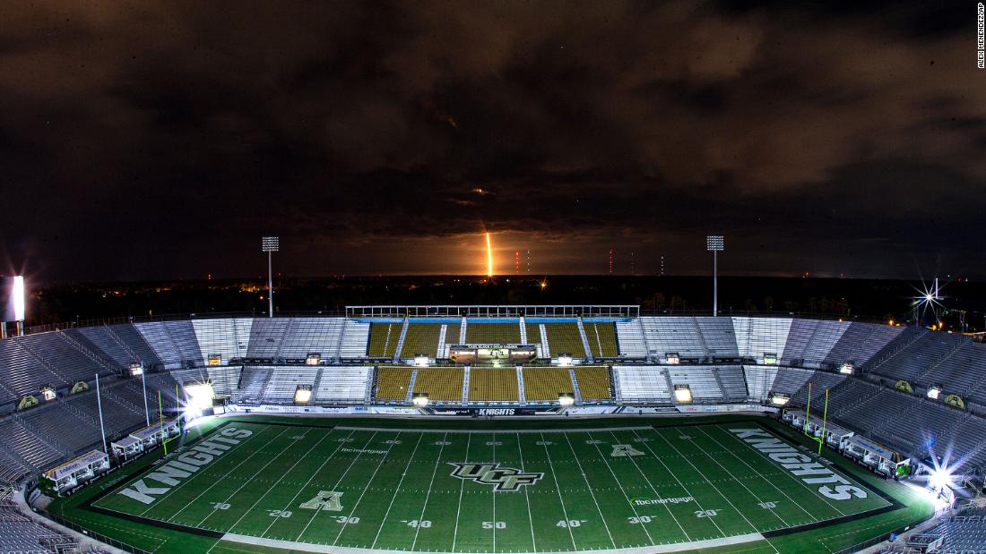 SpaceX&#39;s Falcon 9 rocket is seen over University of Central Florida&#39;s Bounce House-FBC Mortgage Field on November 15 in Orlando, Florida.