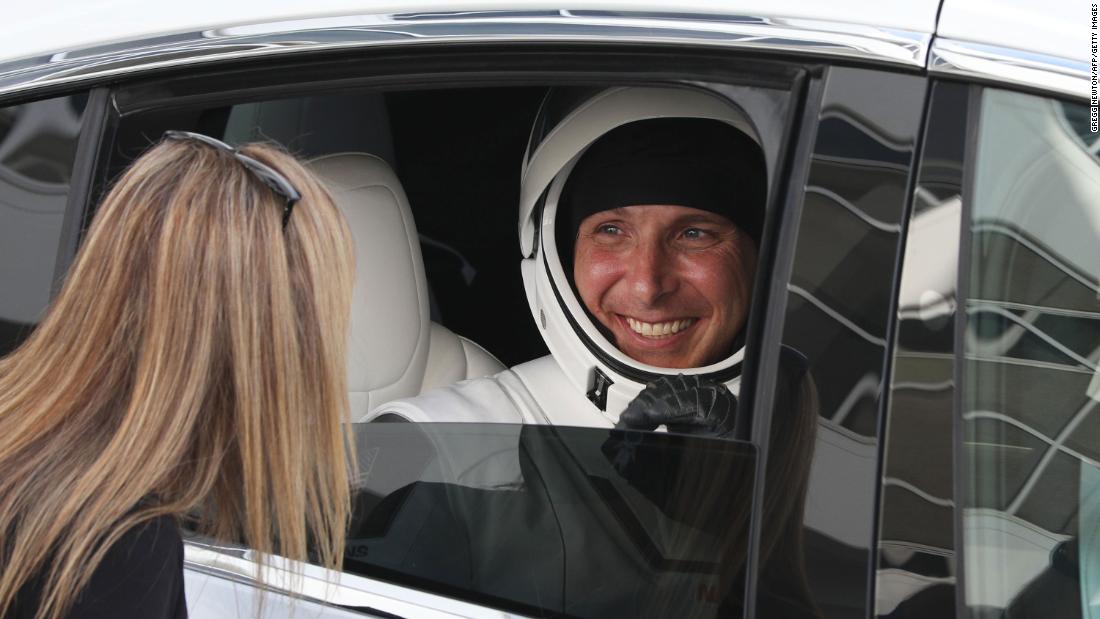 Hopkins says goodbye to a family member before heading to the launch complex.