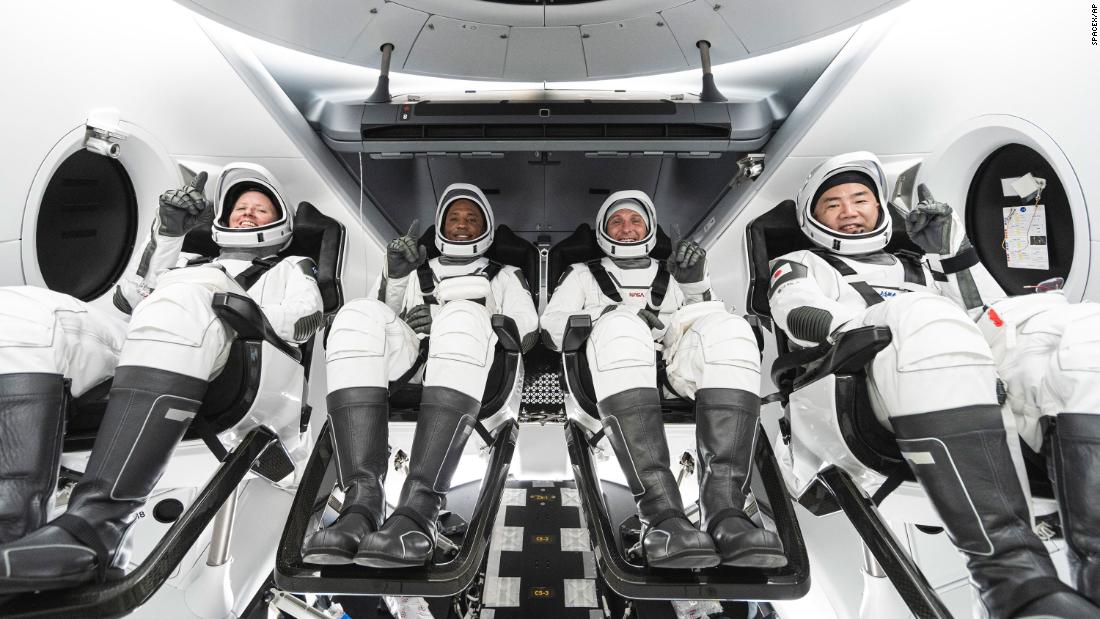 This undated photo released by SpaceX in September shows Walker, Glover, Hopkins and Noguchi inside SpaceX&#39;s Crew Dragon spacecraft. 