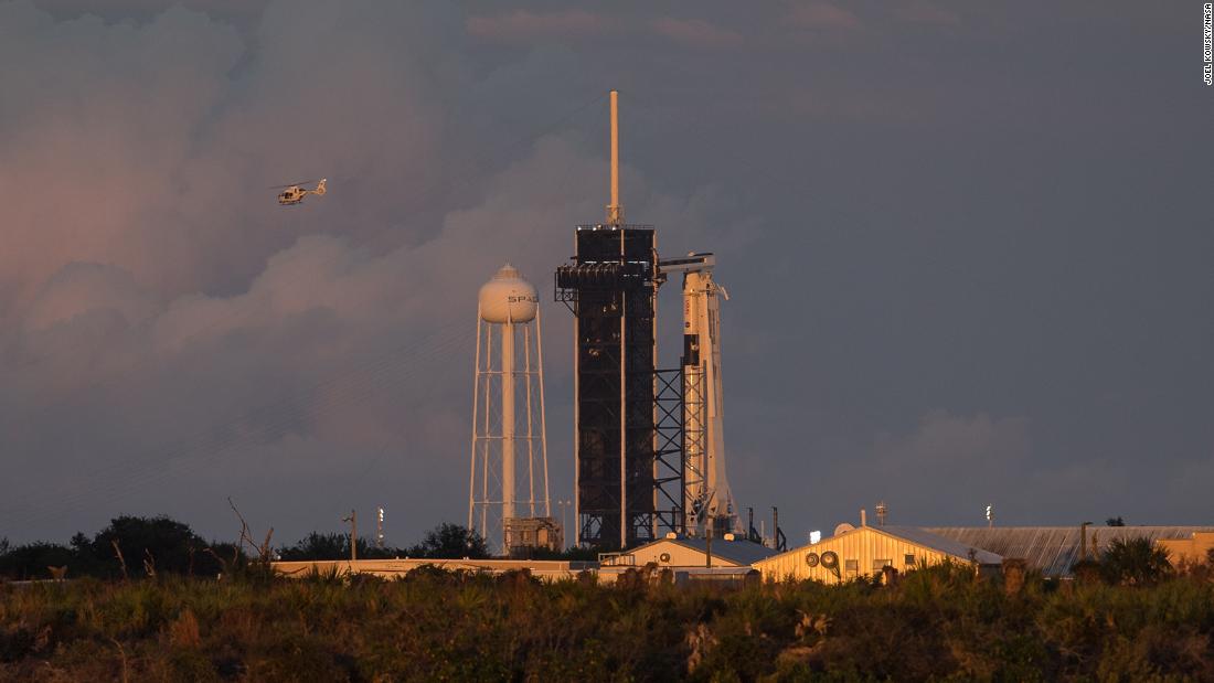 A NASA helicopter flies past the launch pad at Kennedy Space Center on November 15.