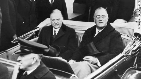 On the day of Franklin Delano Roosevelt's presidential inauguration in 1933, he rides with his predecessor Herbert Hoover to the ceremony. 