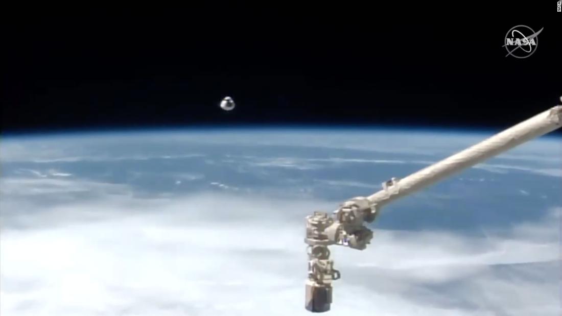 The crew&#39;s capsule is seen approaching the ISS.