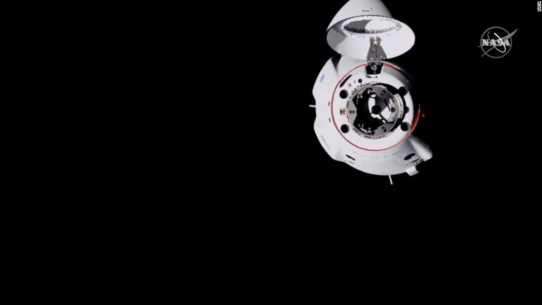 The SpaceX Crew Dragon capsule waits to dock the ISS.