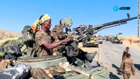 This image, made from undated handout video released by the state-owned Ethiopian News Agency on November 16, 2020, shows Ethiopian military in an armored personnel carrier near the border of the Tigray and Amhara regions of Ethiopia. 