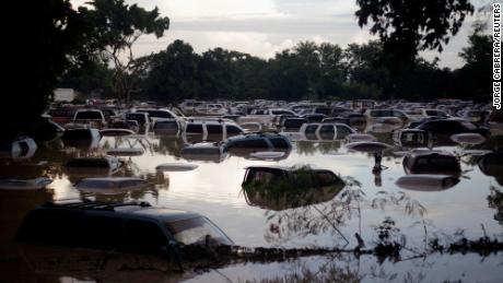 Vehicles submerged after heavy rain caused by Storm Iota, in La Lima, Honduras on November 19, 2020.