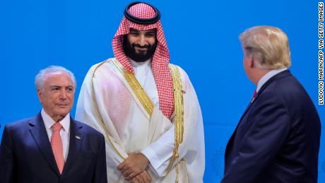 Brazil&#39;s then President Michel Temer, Saudi Arabia&#39;s Crown Prince Mohammed bin Salman and US President Donald Trump line up for the family photo during the G20 leaders&#39; summit in Buenos Aires, on November 30, 2018. 