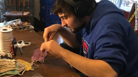 Walter Hebert, Sharon&#39;s son, hard at work on the masks