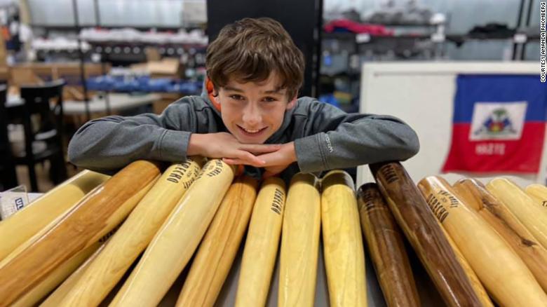 An Iowa boy is selling baseball bats he makes from fallen trees to raise money for storm victims