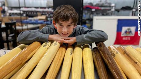 An Iowa boy is selling baseball bats he makes from fallen trees to raise money for storm victims