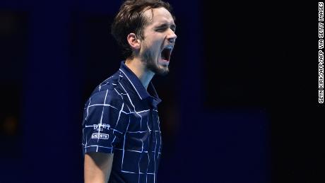 Medvedev celebrates after winning a point against Thiem.