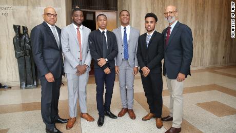United Negro College Fund President and CEO Dr. Michael Lomax (right) and Morehouse University President David A. Thomas (left) with Morehouse students in 2018.